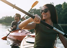 Friends kayaking