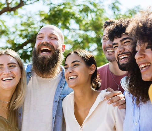 Spark aligners patient smiling with friends