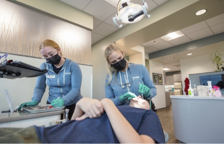 Aerial view of a city with small mountains in the background
