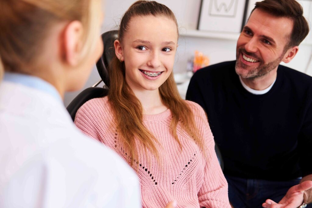 Teen smiling with braces
